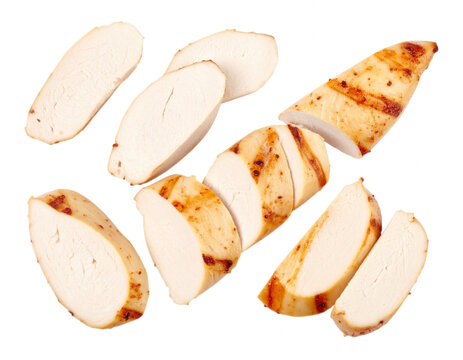 Sliced grilled chicken breast pieces arranged on transparent... isolated on a transparent background