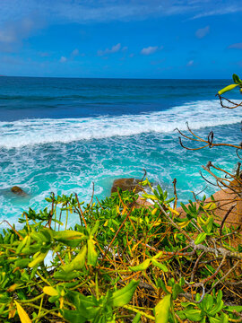 A very rocky pass from Anse Fourmis beach on La Digue island in Seychelles