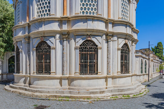 Narrow cobblestone street with tombs and imaret buildings near Ey&uuml;p Sultan Mosque in Istanbul. 
