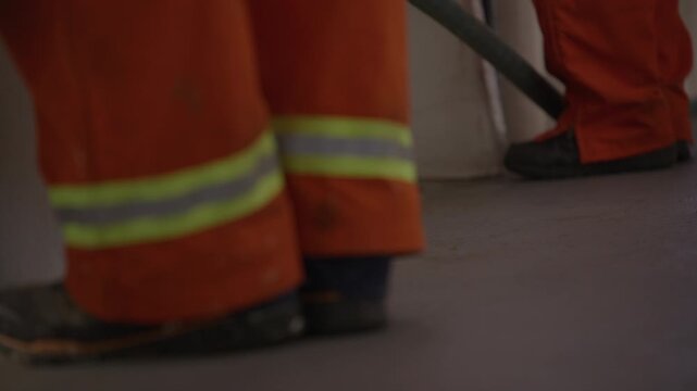 crew of Coast guard ship overlooking the bay of St Johns