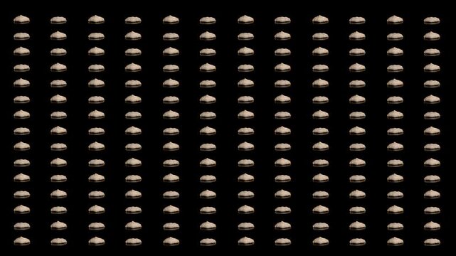 Looped timelapse animation - many croissants baking and rising alternately in checkerboard pattern - loop, black background. Abstract, food, cooking, pastry and time lapse concept