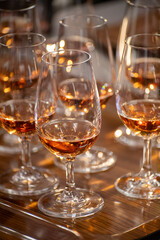 Obraz premium Special tasting event for visitors, pairing food with glass of champagne wine, delightful dishes prepared by renowned cook chefs at winter food and wine festival in France