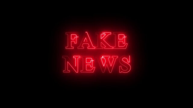 Glowing neon fake news text sign on dark background. Bright red and blue luminous typography with warning concept. Modern media misinformation theme, digital propaganda, online rumors