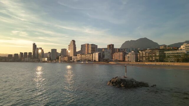 Benidorm skyline and poniente beach at sunset