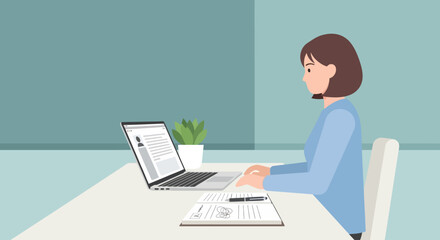 Woman working on laptop and documents at a desk in a calm office environment
