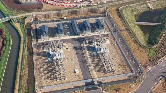 Aerial Drone View of High Voltage Power Transformer at Electrical Substation