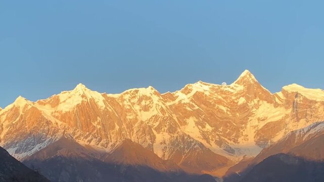 4K Golden Sunrise Alpenglow over Namcha Barwa Peak with Moonset, Himalayas Tibet