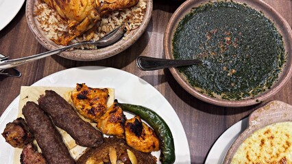 Egyptian dishes: Molokhia, rice with vermicelli, chicken, and side dishes