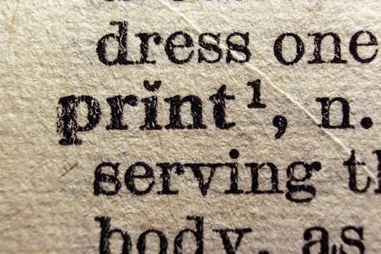 Word print printed on a dictionary page, macro closeup