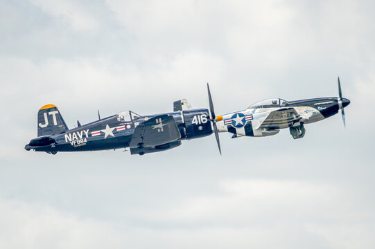 Historic World War II aircraft fly side by side