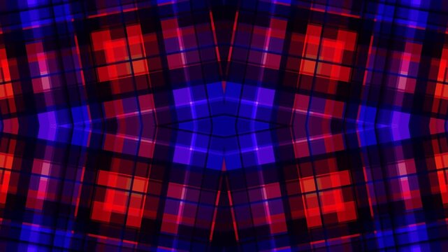 Vibrant abstract pattern of red, blue, and purple squares arranged in a symmetrical design with a dark background and a kaleidoscope effect.