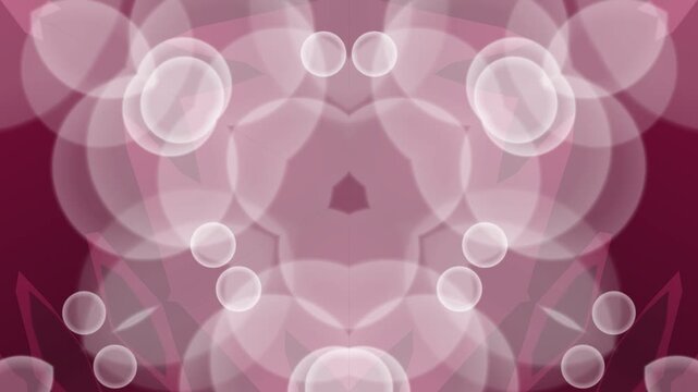 Abstract pattern of overlapping white circles and shapes on a gradient pink and maroon background with a geometric design.