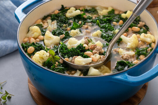 Healthy bean and turkey soup or stew with kale and cauliflower