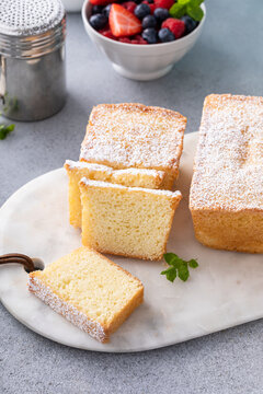 Vanilla pound cake sliced on a board