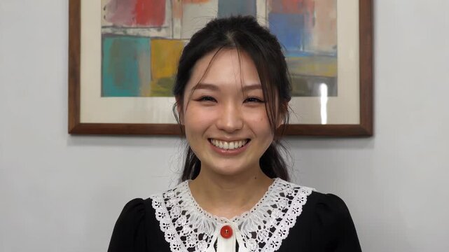 Close-up of smiling women, greetings from Asian women with sweet smiles