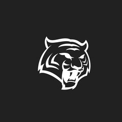Obraz premium Roaring White Tiger Head Logo Emblem on Black Background, Fierce Graphic Mascot Design