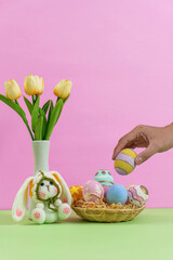 Fototapeta premium Easter bunny and colorful eggs in a festive setting
