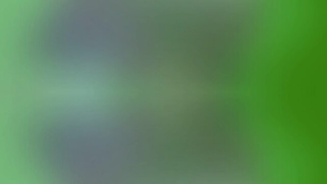 Blurry green and gray gradient background with a mix of dark and light colors
