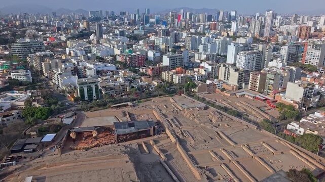 Aerial view of Huaca Pucllana pyramid in Lima with cityscape backdrop