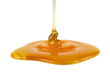 Honey dripping and spreading golden syrup