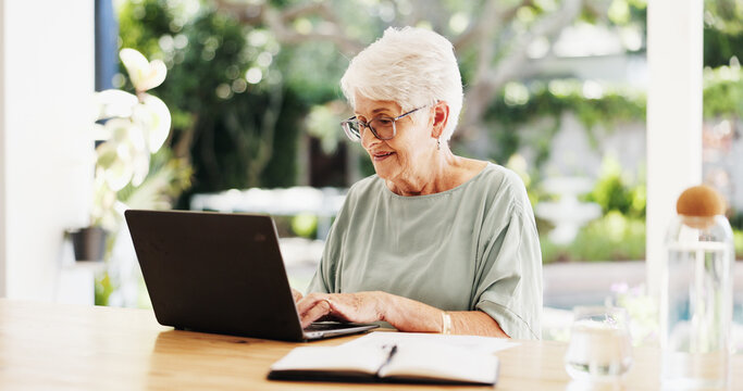 Reading, laptop and senior woman in home, planning for retirement fund and investment portfolio. Apartment, pensioner or old person in lounge, pc or email for insurance benefits or online application