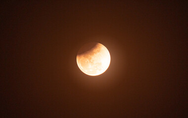 The Worm Moon total lunar eclipse, the last full moon of winter, the Moon moves from right to left as it passes through Earth's shadow. The Moon was taking on a coppery red hue, known as "Blood Moon." © Soumyabrata