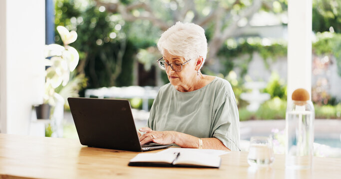 Reading, laptop and senior woman in lounge, planning for retirement policy and investment portfolio. Finance review, pensioner or old person in home, pc or email for insurance benefits or internet