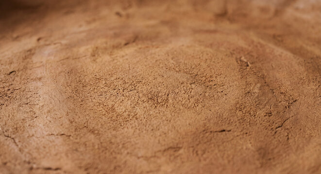 Brown clay earth texture macro natural soil background organic rough ground surface