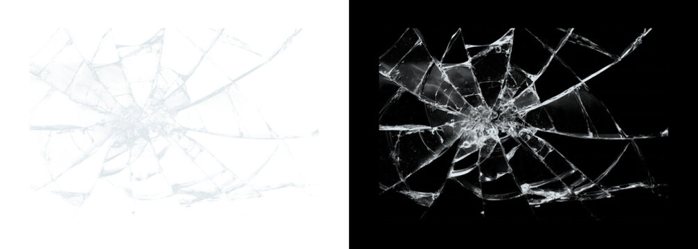 Cracked glass shattered window pane on black and white backgrounds