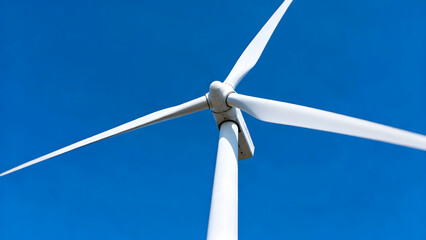 Close Up Wind Turbine Blades Against Bright Blue Sky.
