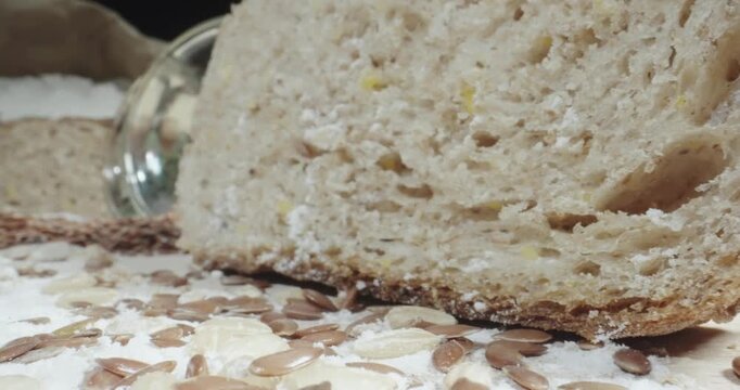 Macro scene dolly shot of bread slice with healthy cereals, probe lens cinematic shot