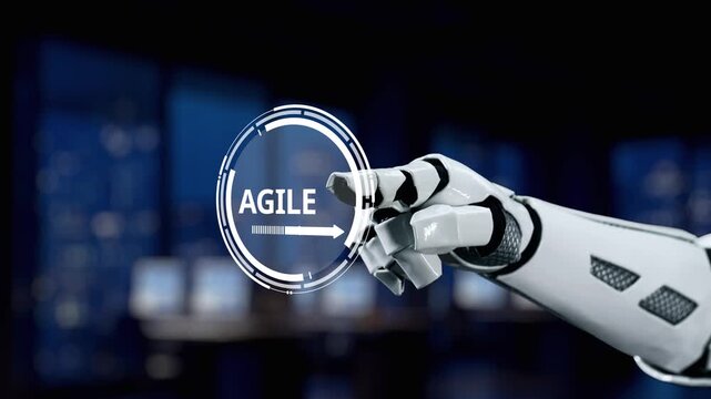 A robotic hand touches a digital agile interface displaying graphs and data. This image represents the integration of technology and creativity in modern workspace environments. Synapse