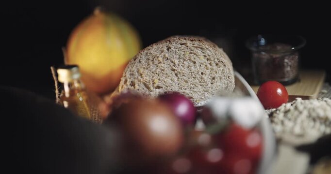Healthy vegan bread choice scene. Multi grain sourdough bread with flax seeds cut.