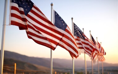 Flags Fluttering Gently on Tall Flagpoles at Sunset