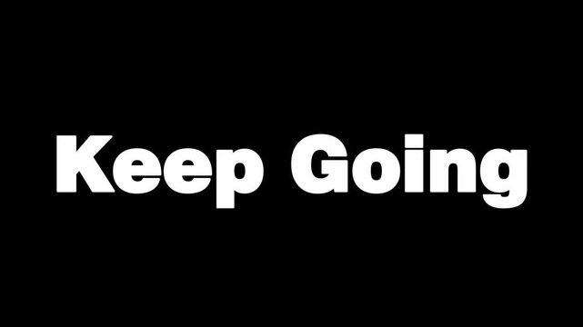 The inspiring phrase "Keep Going" illuminates a dark background, serving as a powerful message of perseverance, resilience, and unwavering determination for anyone facing life's challenges.