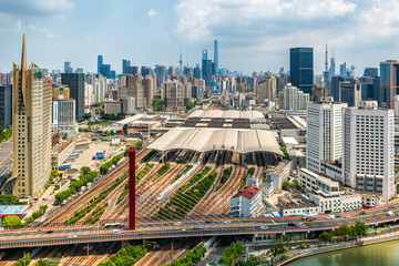 Fototapeta premium Shanghai Railway Station with Urban Cityscape and Transportation Infrastructure