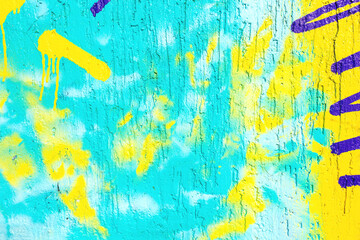 Abstract urban graffiti on rough wall with blue, yellow, purple colors. 90s, Y2K style, street culture, textured paint surface. Posters, backgrounds, street art, urban banner, modern 2000s visuals. © Aleksandra Konoplya