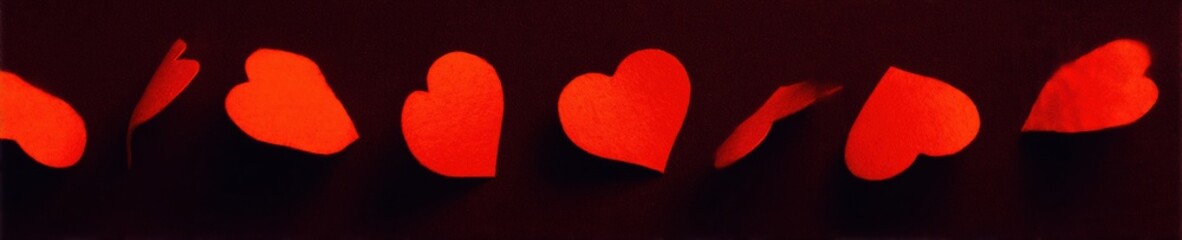 Red Paper Hearts on Dark Background for Valentines Day Greeting Card with Copy Space, Elegant Horizontal Composition for Romantic Love Postcard Template