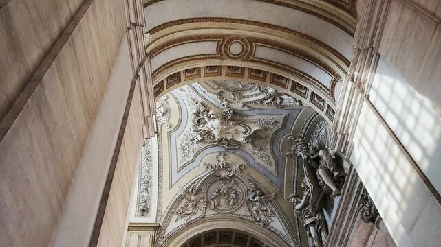 Exterior ceiling detail with worior on horse sculpture at of St. Peter's papal basilica in Vatican, Rome, Itlay