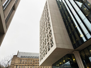 Naklejka premium Modern glass and circular facade building in Manchester city centre for a contemporary office image