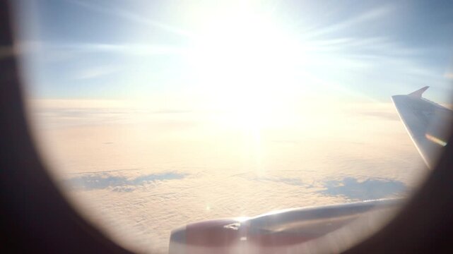Sunrise View From Airplane Window Above Endless Cloud Sea With Golden Glow, Winglet Silhouette At Right, Soft Rays And Warm Tones, Highaltitude Calm And Photographer Mood During Dawn Flight