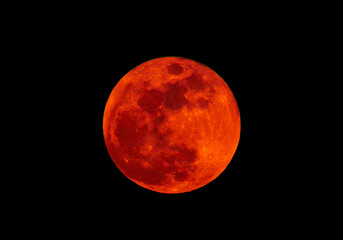 Obraz premium Close-up with blood moon, a dramatic reddish-orange hue the moon takes on during a total lunar eclipse