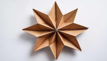 Obraz premium Brown Five Pointed Star Shape Cut From Cardboard Isolated On White Background
