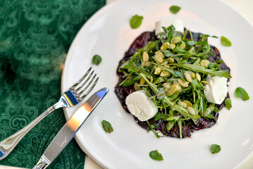 Gourmet Beetroot Salad with Arugula, Goat Cheese, and Pumpkin Seeds