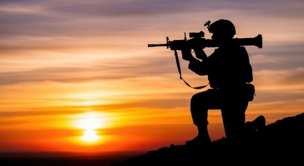 Soldier silhouette aiming rifle at sunset