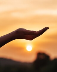 Reaching for the sun hand gesture at sunset outdoor serenity nature's beauty peaceful atmosphere