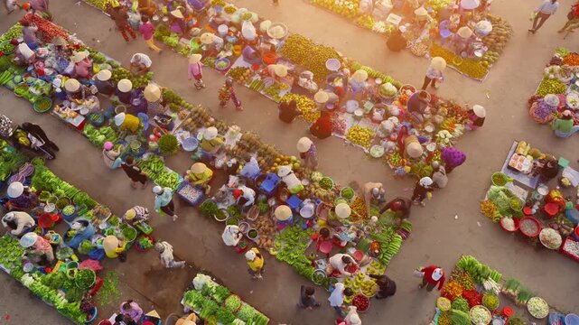 Aerial view of busy local daily life of the morning local market in Vi Thanh or Chom Hom market, Mekong Delta, Vietnam.
