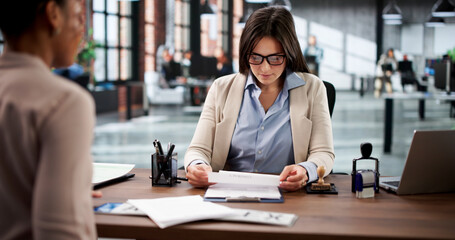 Young Woman At DMV Registering First Car