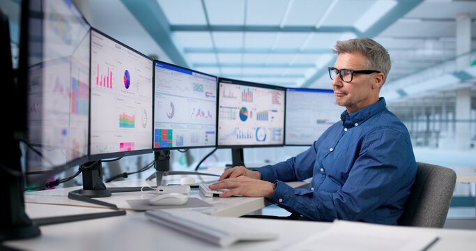 Focused Businessman Analyzing KPI Data