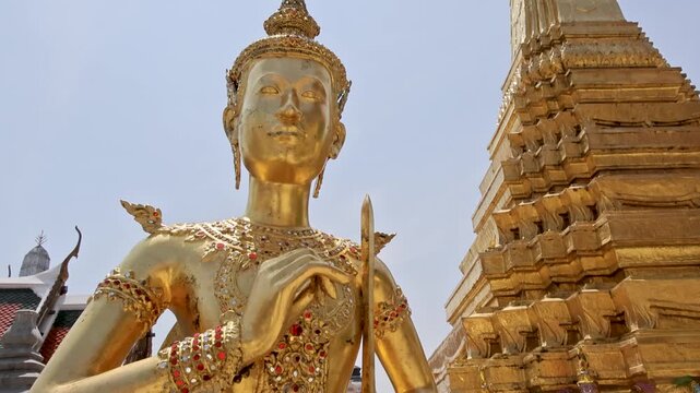 Golden Guardian Statue Beside Phra Si Rattana Chedi at Wat Phra Kaew Bangkok